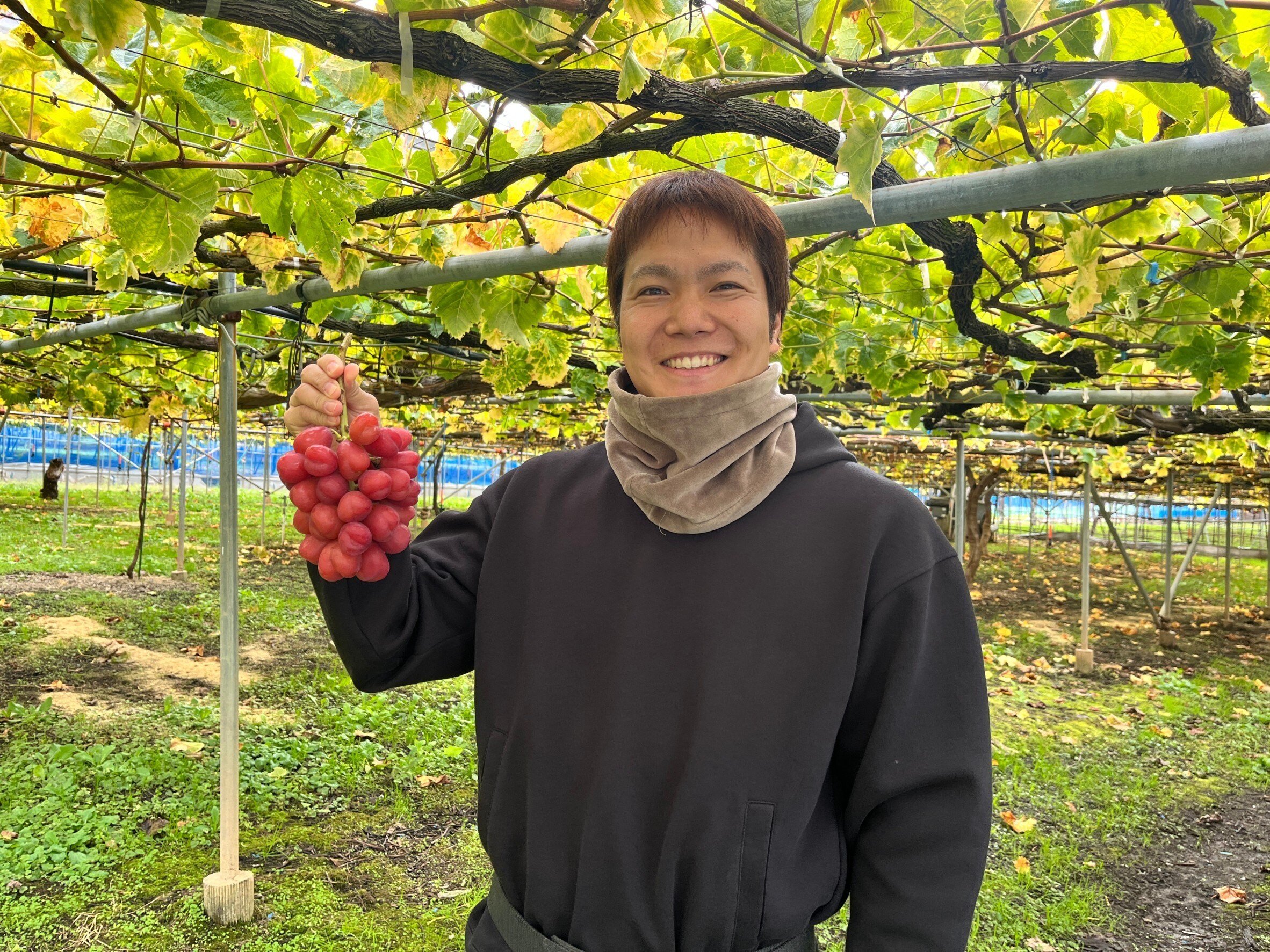  須坂市「カネ十農園」の広報担当の藤沢拓也さん。